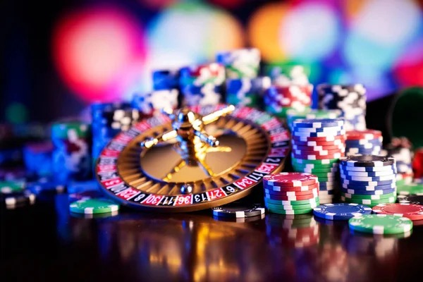 Mobile phone displaying Texas Hold'em Bonus interface with betting buttons and community cards